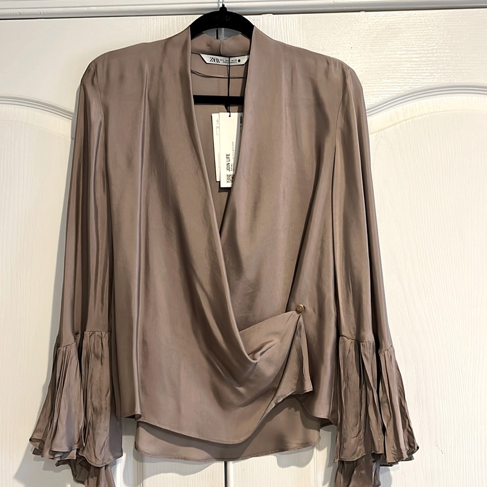 Blouse with bell sleeves